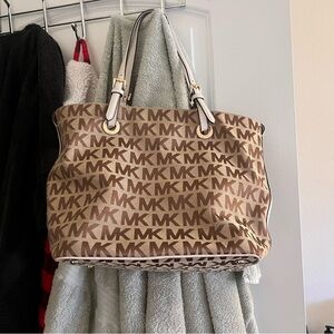 Michael Kors Tote & Crossbody. Crossbody brand new & tote has been used 2/3 time
